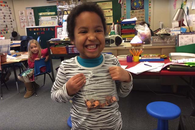 Irene with pennies at school, Fort Collins, Colorado, 2019
