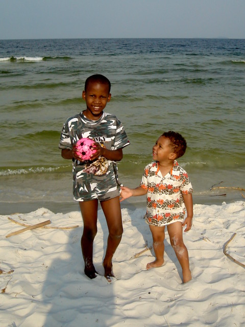 Deo and Joachim on a beach, Bukoba, Tanzania, 2008