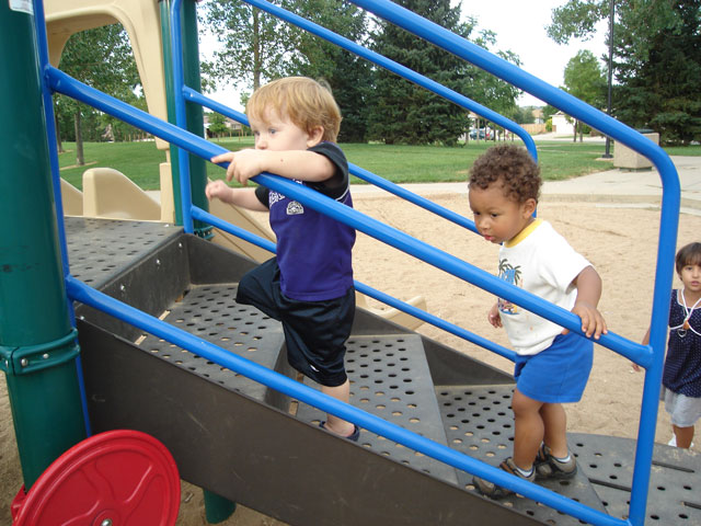 Dylan and Joachim climbing steps, Fort Collins, Colorado, 2007