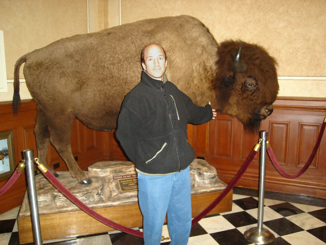 Greg with buffalo, Cheyenne, Wyoming, 2006