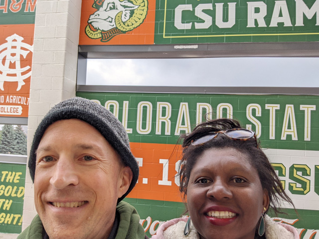 Greg and Joanitha at a CSU Rams football game, Fort Collins, Colorado, 2022