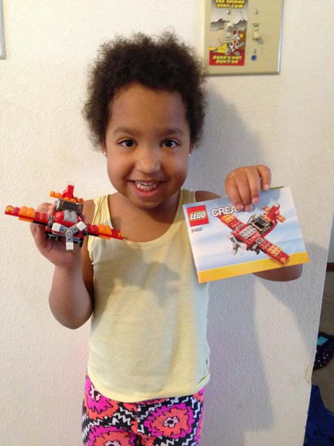 Irene with lego airplane, Fort Collins, Colorado, 2018