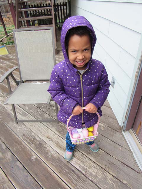 Irene with a basket of easter eggs, Fort Collins, Colorado, 2018