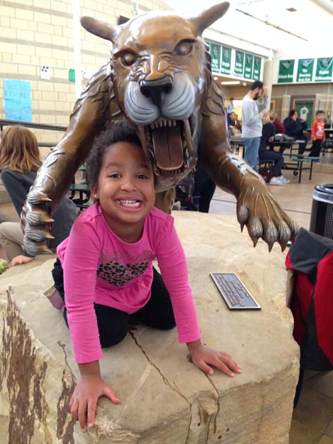 Irene with scuplture at Fossil Creek High School, Fort Collins, Colorado, 2018