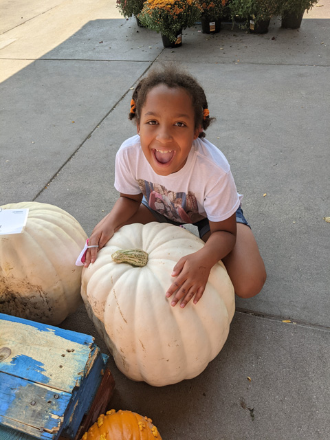 Irene with pumpkins, Fort Collins, Colorado, 2021