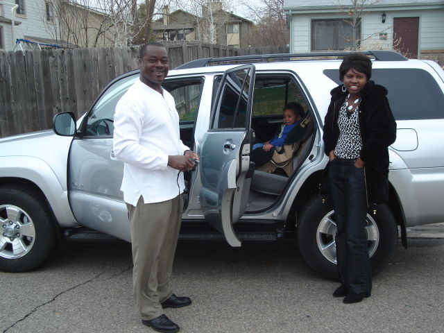Emmanuel Edomwande with his car, Fort Collins, Colorado, 2008