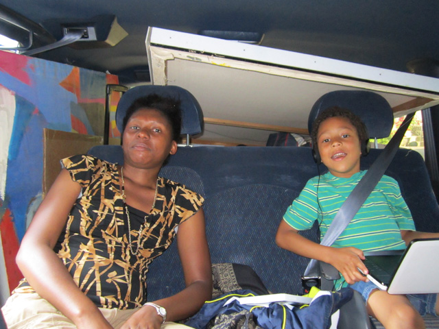Joanitha and Joachim in Grandpa's full van, South Bend, Indiana, 2011