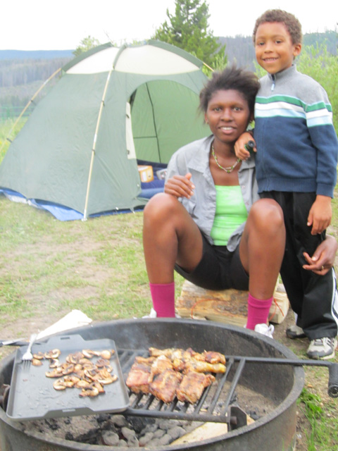 Joanitha and Joachim with grill and tent, Rocky Mountain National Park, Colorado, 2011