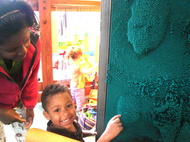Joanitha and Joachim with pin sculpture, children's museum, Santa Fe, New Mexico, 2009
