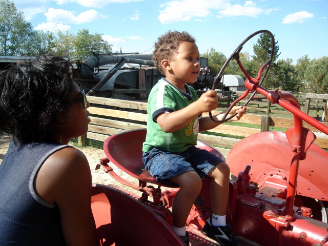 Joachim on a tractor, Lee Martinez Park, Fort Collins, Colorado, 2008