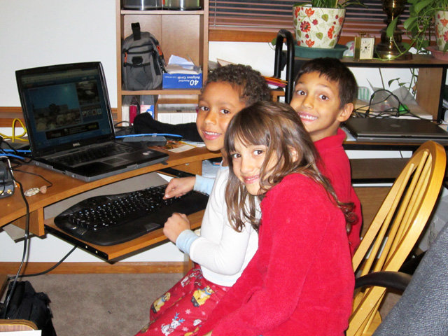 Joachim, Alea and DeAndre at the computer, Fort Collins, Colorado, 2011
