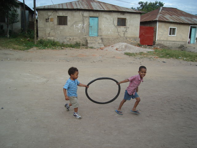 Joachim and a boy with a tire, Mwanza, Tanzania, 2008