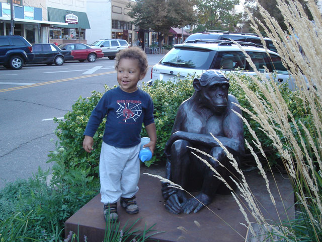Joachim with chimp statue, Loveland, Colorado, 2007