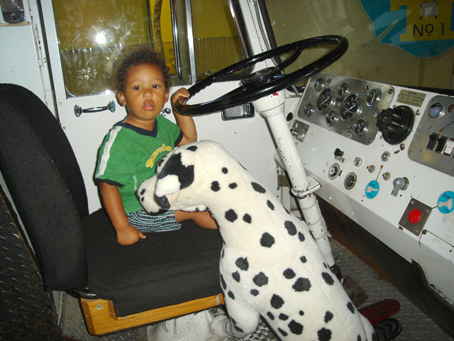 Joachim and dog in fire truck, Children's Museum, Denver, Colorado, 2007