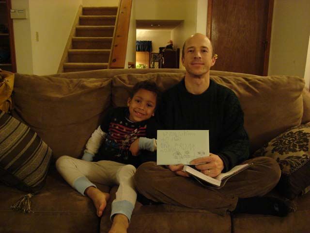 Joachim and Greg with birthday card, Fort Collins, Colorado, 2011