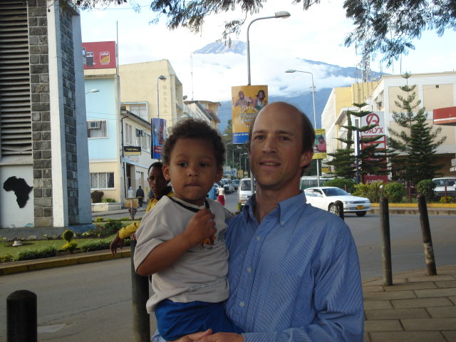 Greg and Joachim by the clock tower, Arusha, Tanzania, 2008