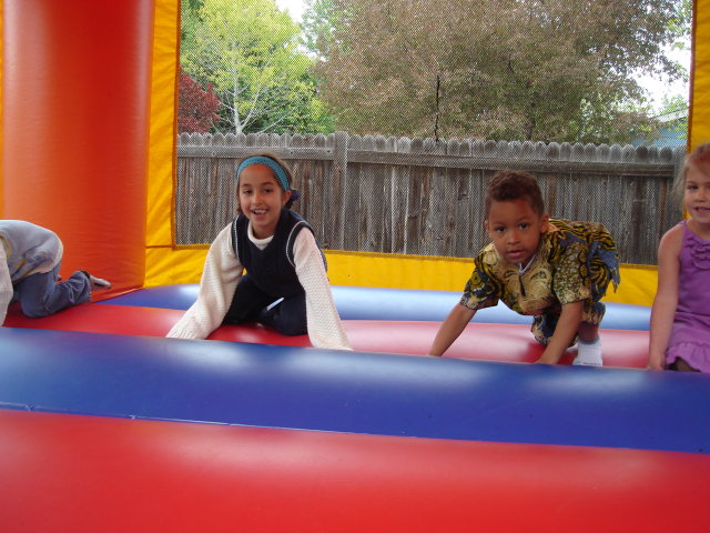 Joachim and Latifah in a bouncy castle, Fort Collins, Colorado, 2009