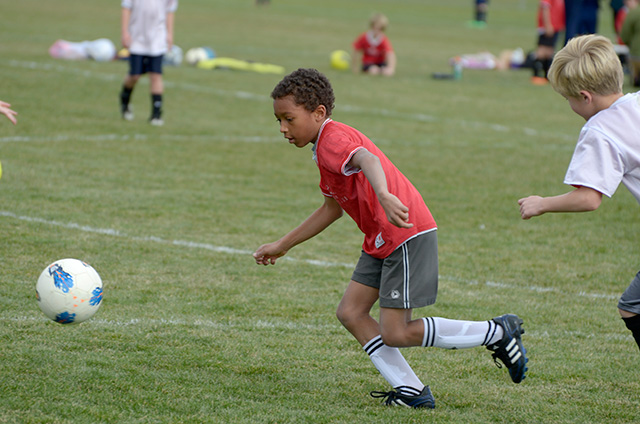 Joachim chasing a soccer ball, Fort Collins, Colorado, 2013