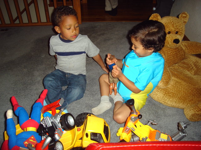Joachim and Tariq with toys, Fort Collins, Colorado, 2009