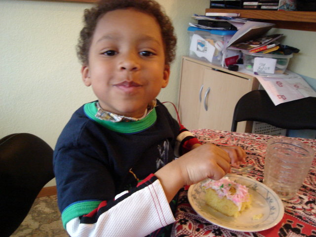 Joachim eating cake at Tariq's birthday, Fort Collins, Colorado, 2009