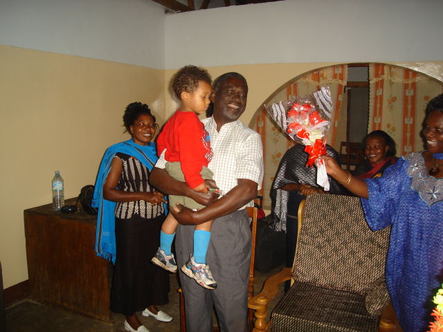 Joachim greeted by grandpa Vicent in his house, Busimbe, Tanzania, 2008