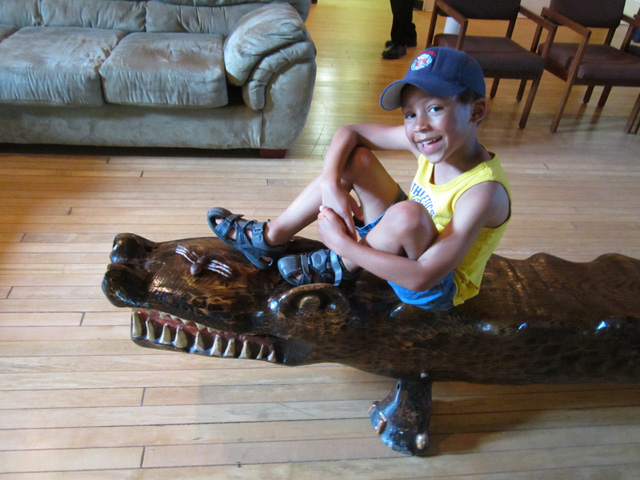 Joachim on a wooden alligator, South Bend, Indiana, 2011