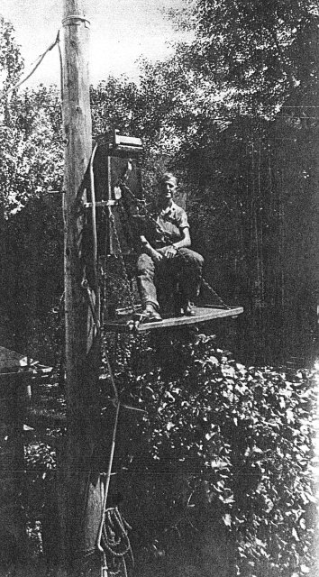 Michael Vogl on a utility pole, Milwaukee, Wisconsin, 1940