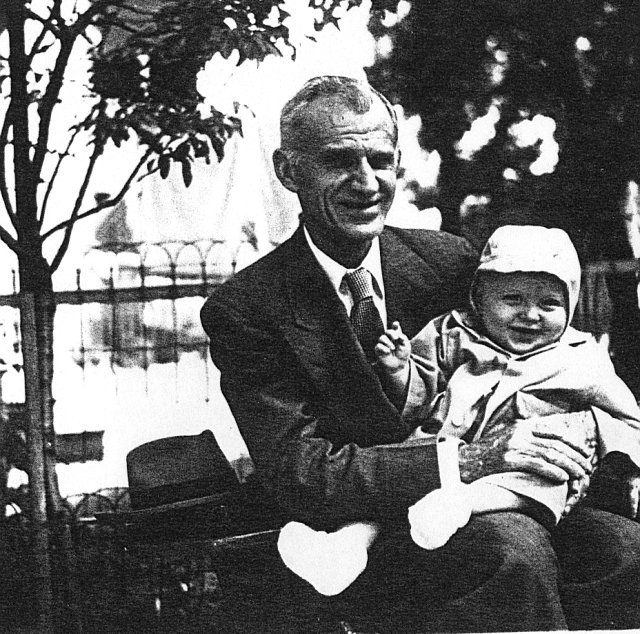 Michael Vogl with baby, Milwaukee, Wisconsin, 1955?