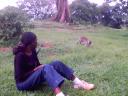 Joanitha and monkey, national arboretum, Entebbe, Uganda, 2003