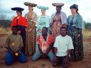 Peace Corps Volunteers in Herero dress with language trainers, Windhoek, Namibia, 1994