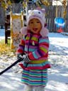 Irene with snow shovel and hello kitty hat, Fort Collins, Colorado, 2015