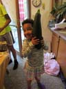 Irene with large zucchini, Fort Collins, Colorado, 2018