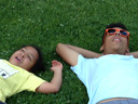 Irene and Joachim lying on the grass, Aspen, Colorado, 2021