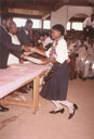 Joanitha receiving her secondary school certificate, Bukoba, Tanzania, 1995