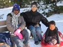 Joanitha, Greg and Irene with sled, Elk Meadow Park, Evergreen, Colorado, 2019