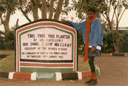 Joanitha near a tree planted by President Moi, Kisumu, Kenya, 1997
