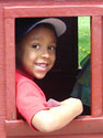 Joachim and Dylan in caboose of City Park train, Fort Collins, Colorado, 2010