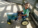 Joachim on a toy tractor, Lee Martinez Park, Fort Collins, Colorado, 2008