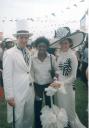 Joanitha and two hatted characters, Speke Resort, Munyonyo, Uganda, 2003