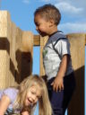 Maddy and Joachim on a playground, Fort Collins, Colorado, 2008